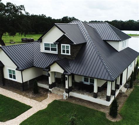 house with black shutters metal roof|black metal roof exterior homes.